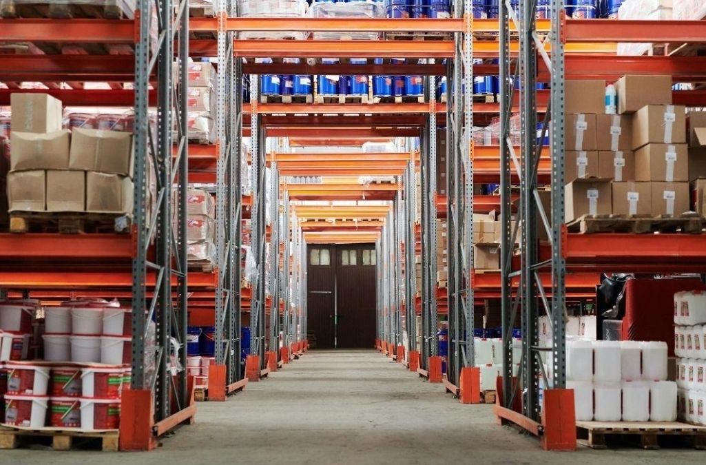 Warehouse floor with rows of boxes